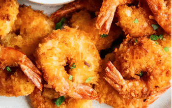 Coconut battered fried shrimp served with sweet & sour sauce